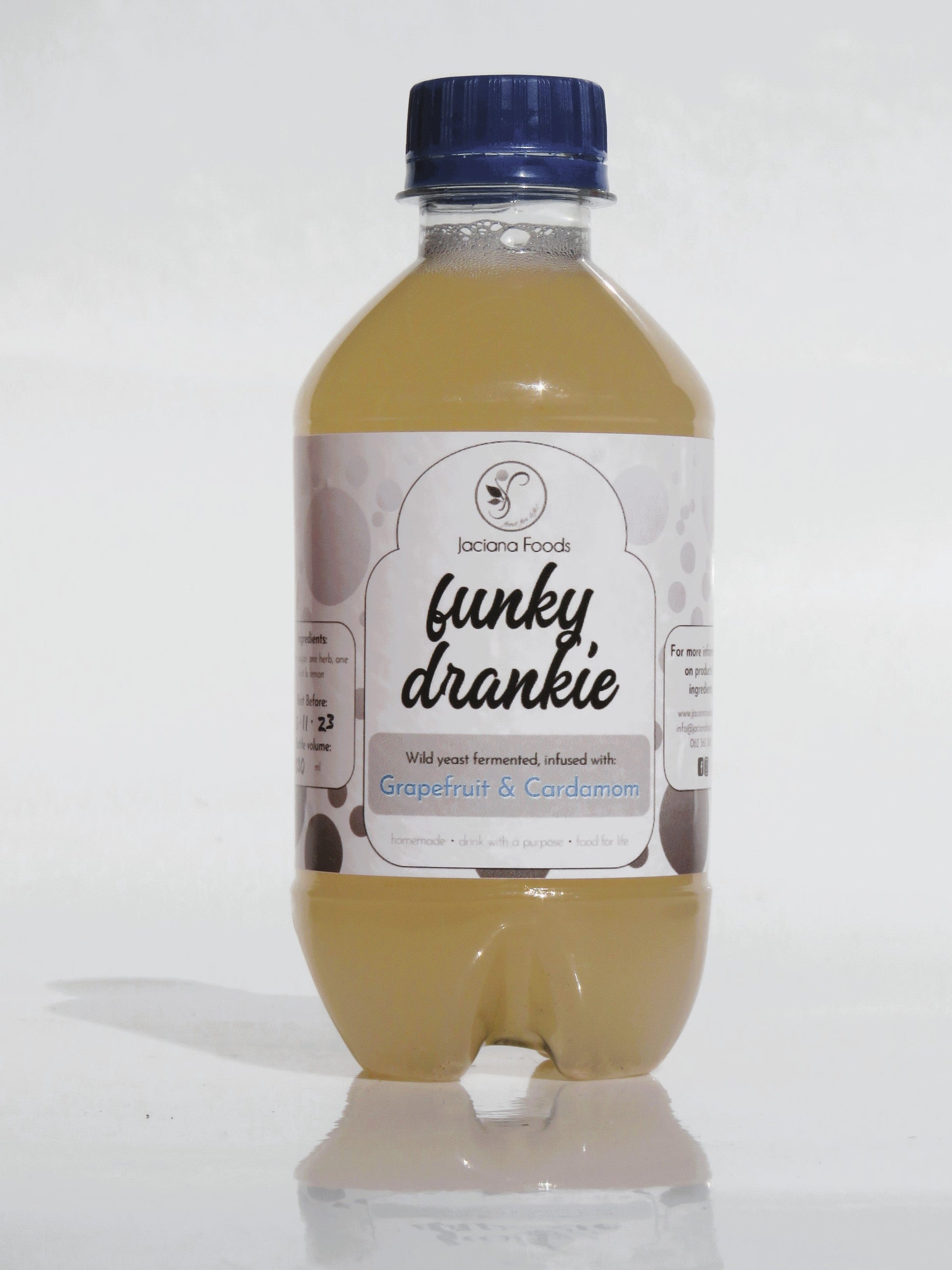 A bottle of Grapefruit and Cardamom Funky Drankie